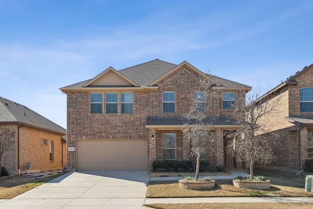 front of property with a garage