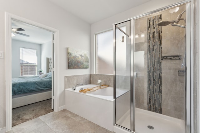 bathroom featuring ceiling fan, tile patterned floors, and separate shower and tub