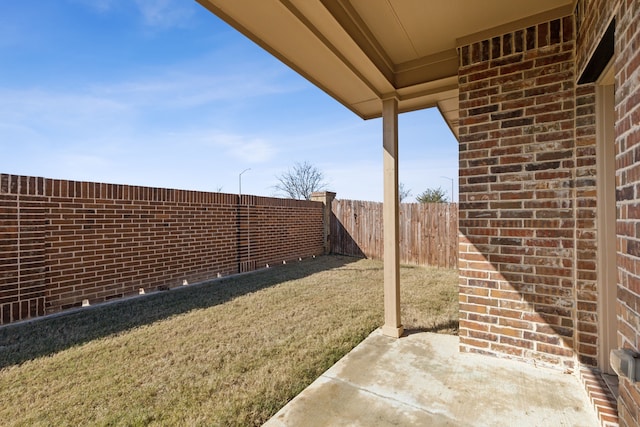 view of yard with a patio area