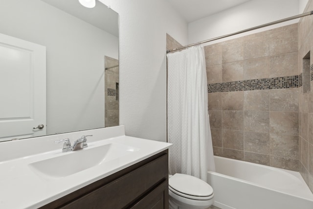 full bathroom featuring vanity, toilet, and shower / bath combo with shower curtain