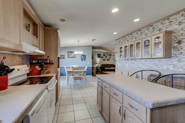 kitchen with pendant lighting, light tile patterned floors, white appliances, tasteful backsplash, and light brown cabinetry