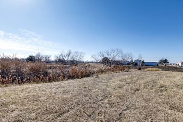 view of yard featuring a rural view