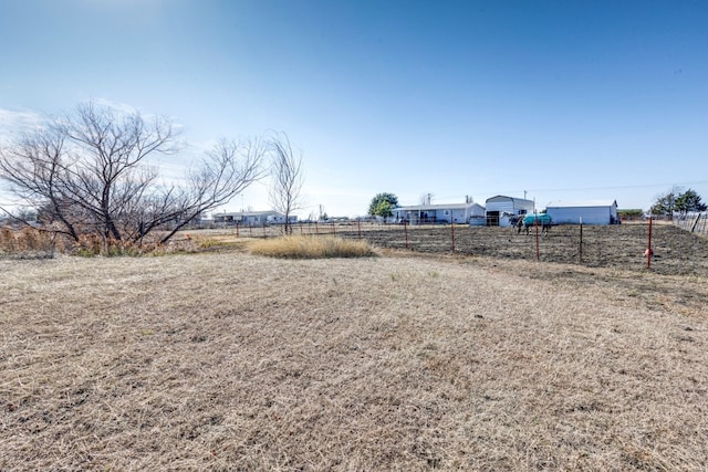 view of yard featuring a rural view