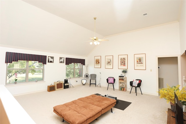 carpeted living room with high vaulted ceiling and ceiling fan