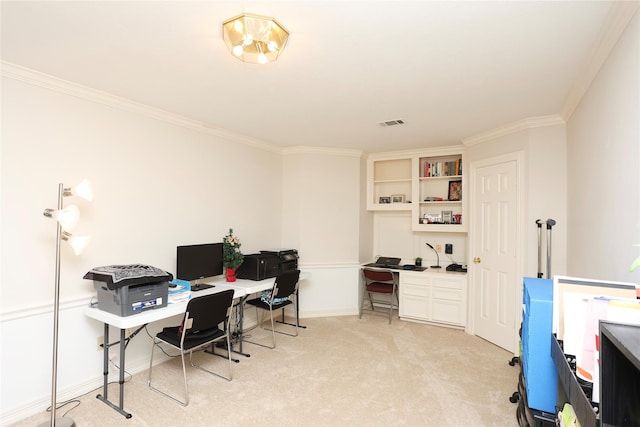 carpeted home office with ornamental molding