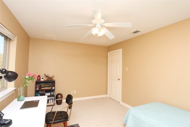 carpeted bedroom featuring ceiling fan