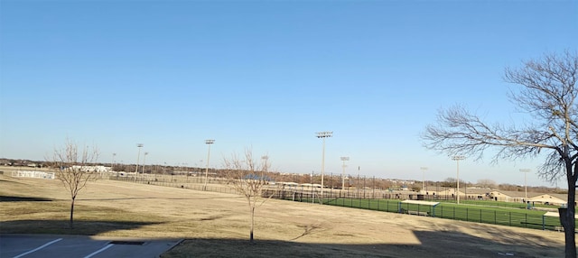 view of property's community featuring a lawn