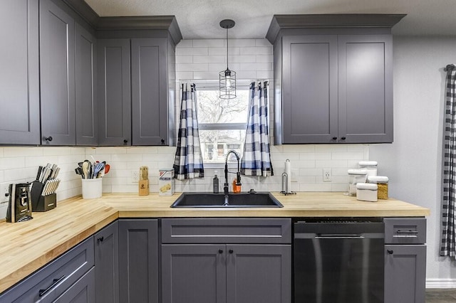 kitchen with sink, gray cabinets, and wooden counters