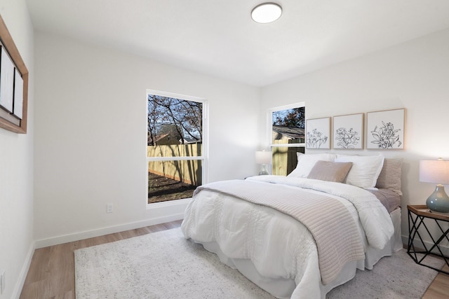 bedroom with light hardwood / wood-style floors