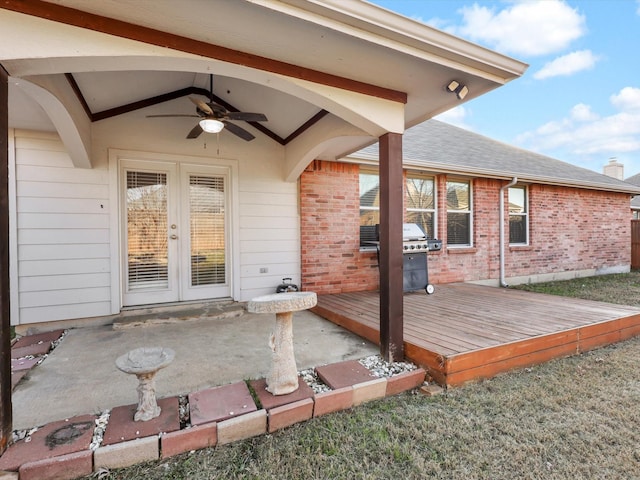 view of patio with french doors, ceiling fan, grilling area, and a deck