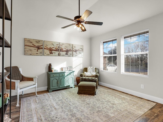 sitting room featuring hardwood / wood-style flooring and ceiling fan