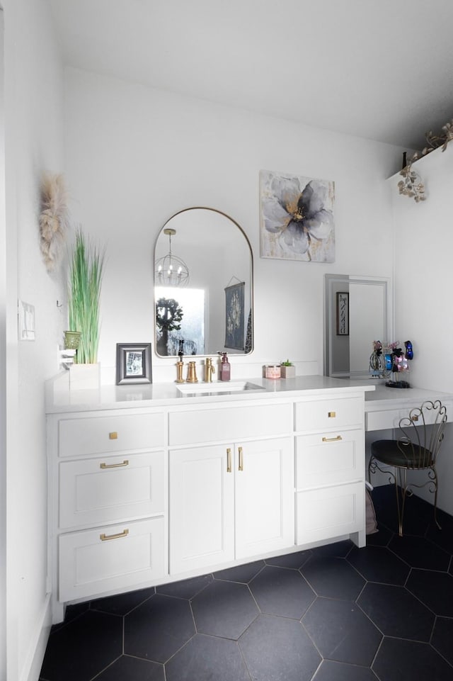 bathroom with tile patterned floors and vanity