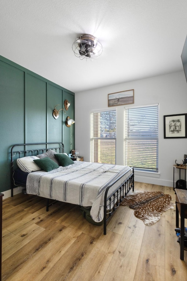 bedroom featuring hardwood / wood-style floors