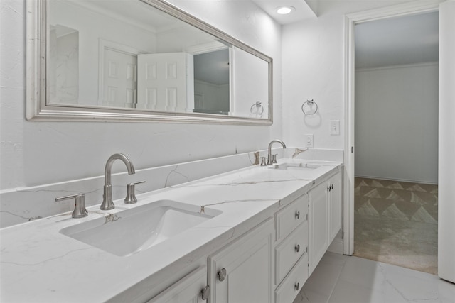 bathroom featuring vanity and crown molding