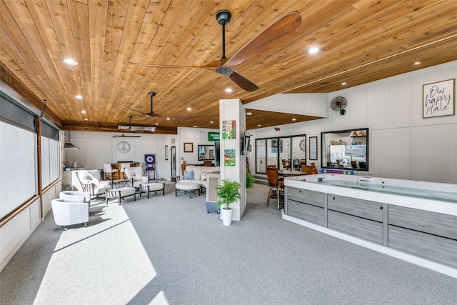 misc room with wooden ceiling, ceiling fan, and carpet flooring