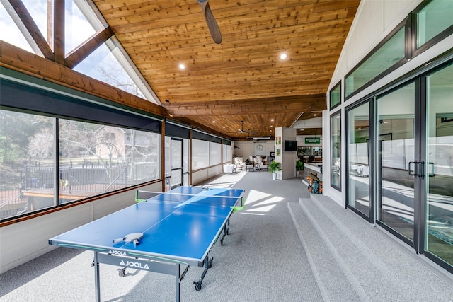 game room with wood ceiling, light colored carpet, and lofted ceiling