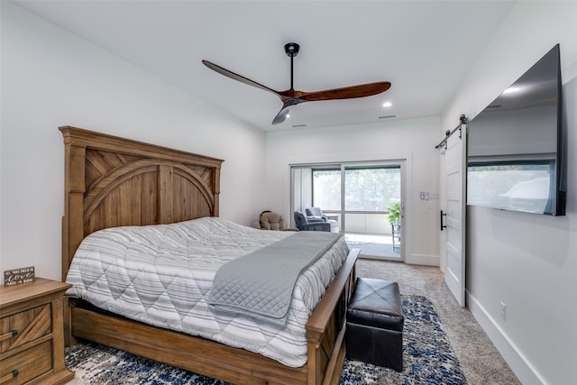 bedroom with a barn door, access to outside, light carpet, and ceiling fan