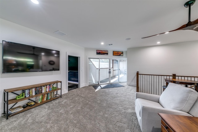 sitting room featuring carpet floors