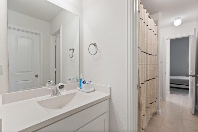 bathroom featuring vanity and tile patterned floors