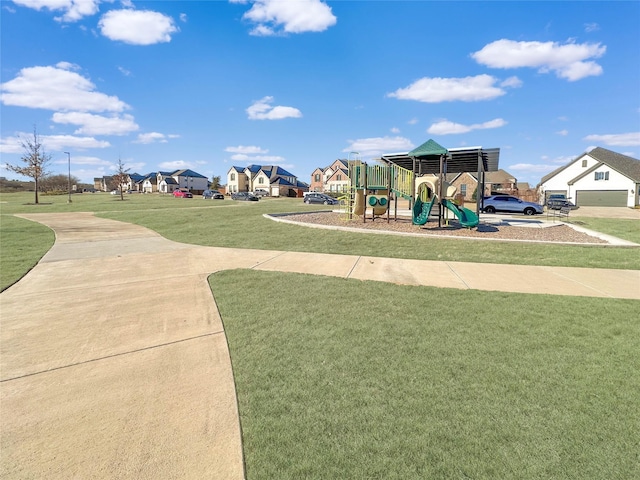 view of playground featuring a lawn