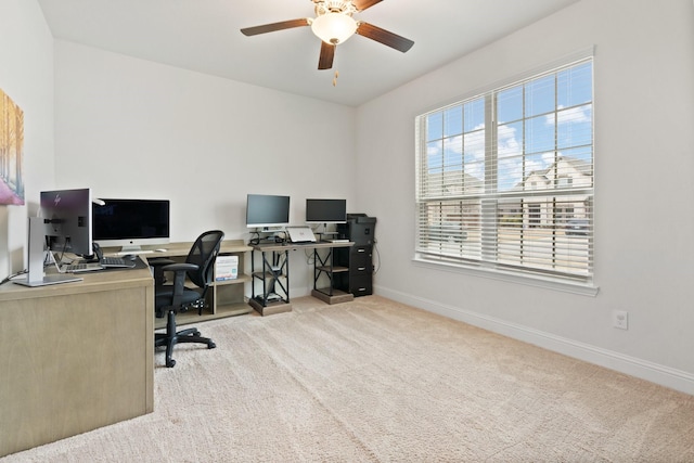 office with ceiling fan and light colored carpet