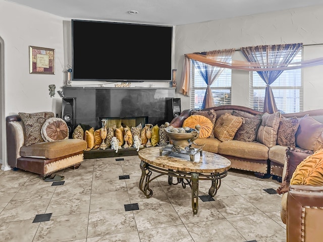 living room with tile patterned flooring