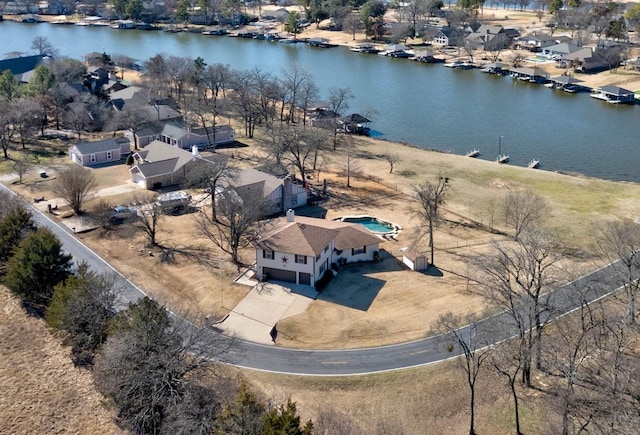 bird's eye view with a water view