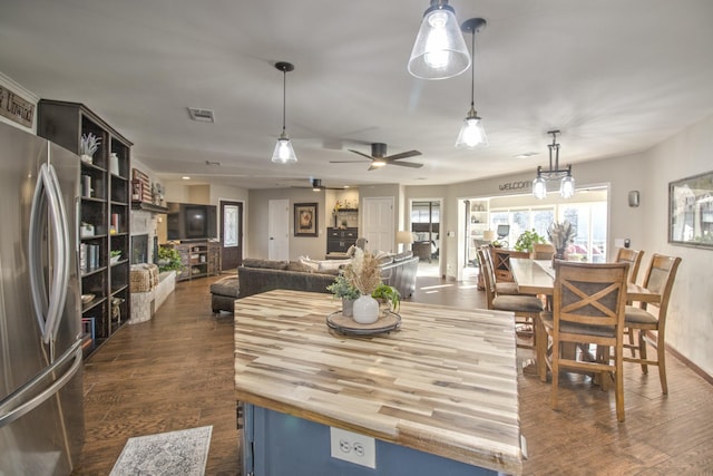 dining area featuring dark hardwood / wood-style floors