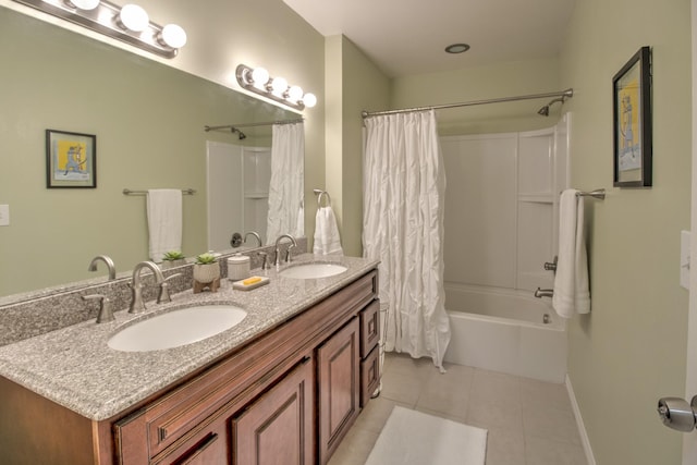 bathroom featuring vanity, tile patterned flooring, and shower / bath combo