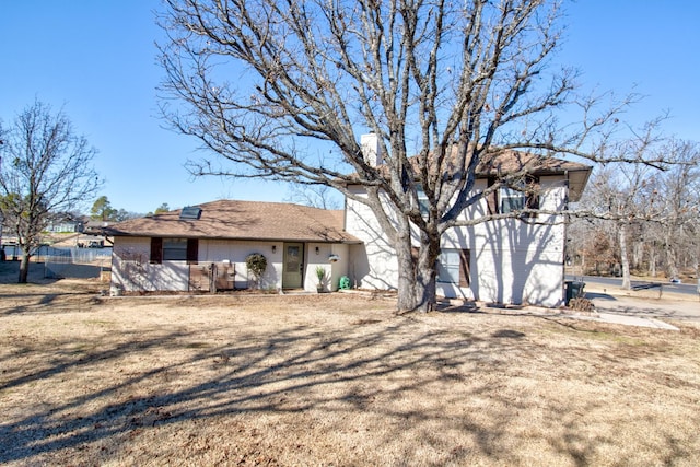 exterior space with a front lawn