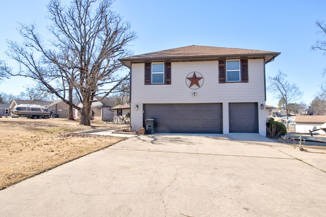 view of front of property with a garage