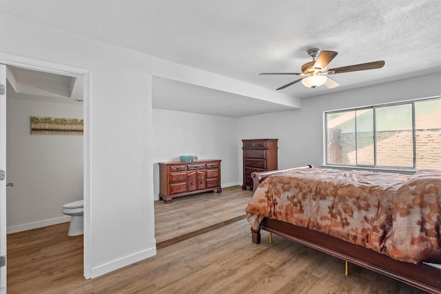 bedroom featuring hardwood / wood-style floors and ceiling fan