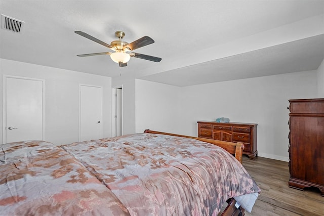 unfurnished bedroom featuring ceiling fan and light hardwood / wood-style flooring