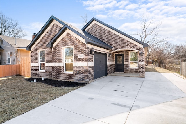 view of front of property with a garage