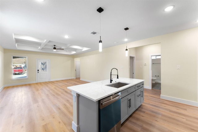 kitchen featuring sink, hanging light fixtures, coffered ceiling, stainless steel dishwasher, and beam ceiling