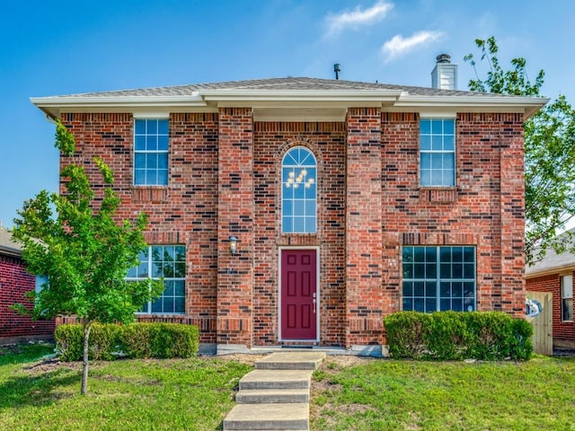 view of front of house featuring a front lawn