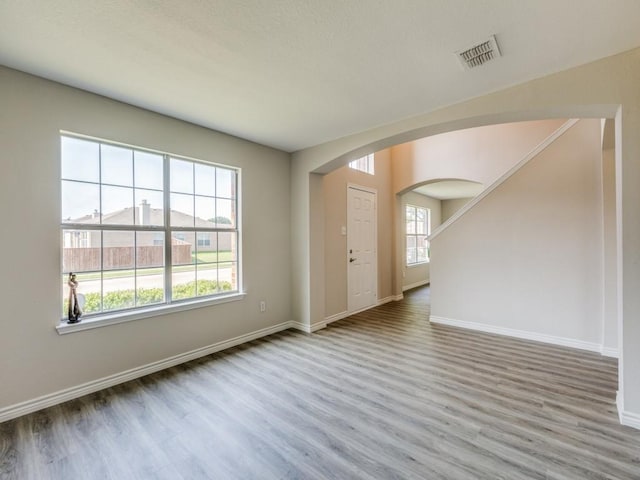 unfurnished room featuring light hardwood / wood-style flooring