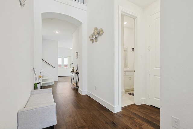 hallway featuring dark hardwood / wood-style floors