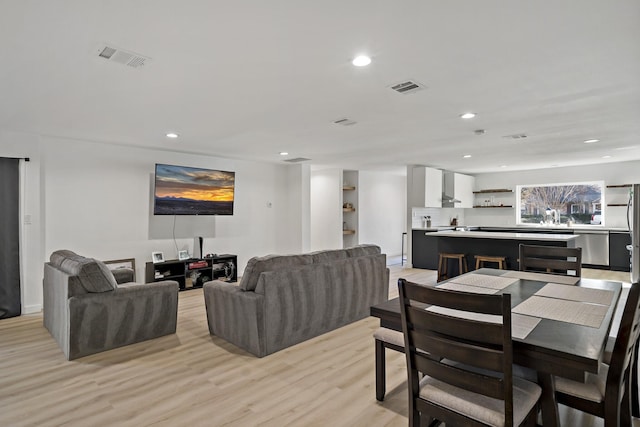 living room with light wood-type flooring