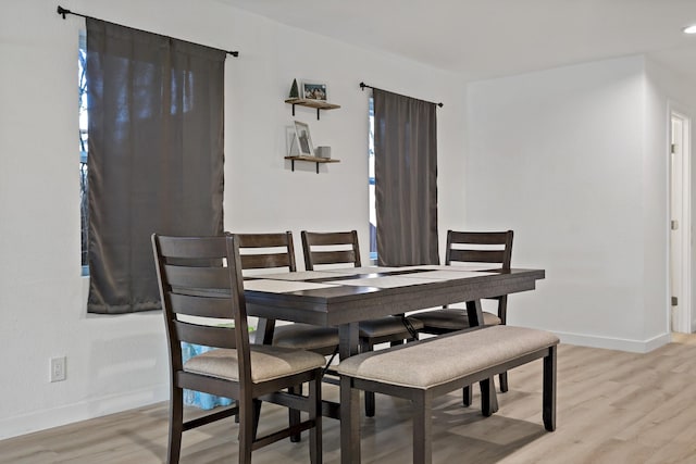 dining room with light wood-type flooring