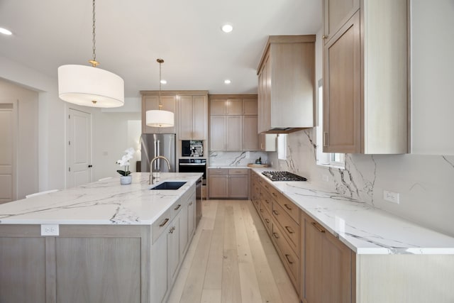 kitchen with tasteful backsplash, hanging light fixtures, appliances with stainless steel finishes, and a spacious island