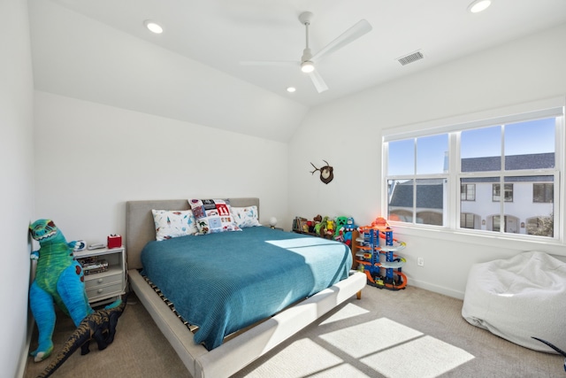 carpeted bedroom featuring lofted ceiling and ceiling fan