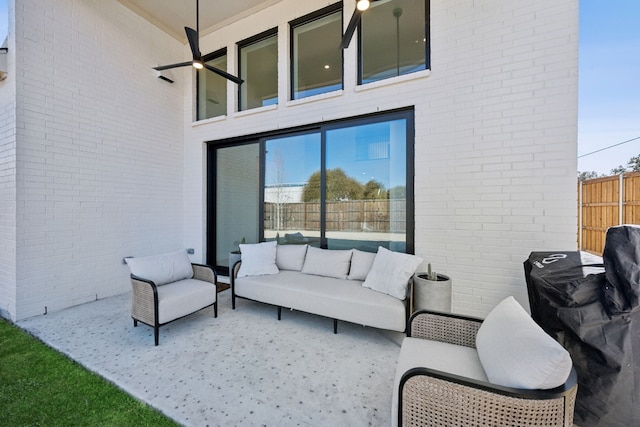 view of patio featuring ceiling fan and outdoor lounge area