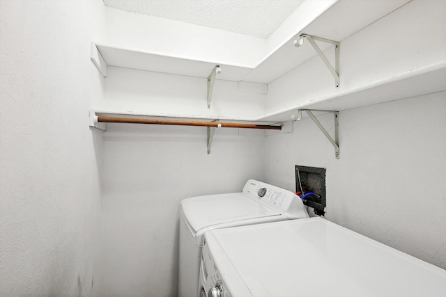 laundry room with separate washer and dryer