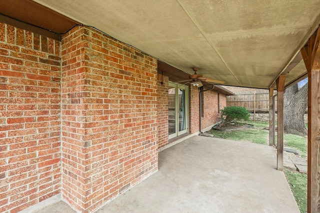 view of patio featuring ceiling fan