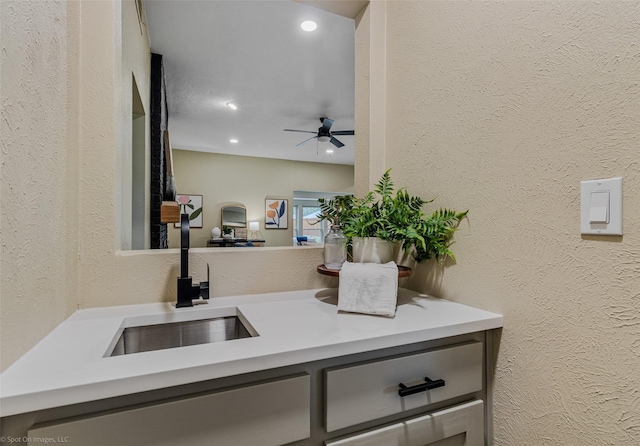 interior space with ceiling fan