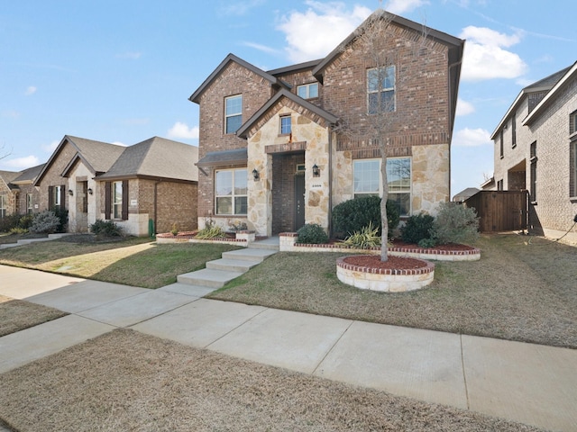 view of front of property featuring a front lawn