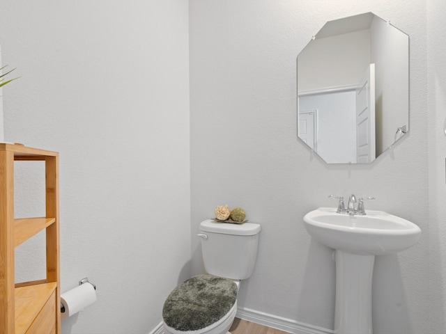 bathroom featuring toilet