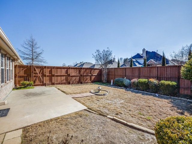 view of yard with a patio area