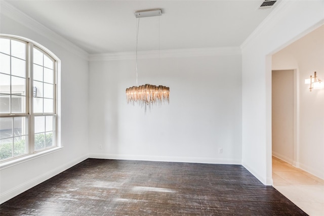 unfurnished room featuring ornamental molding